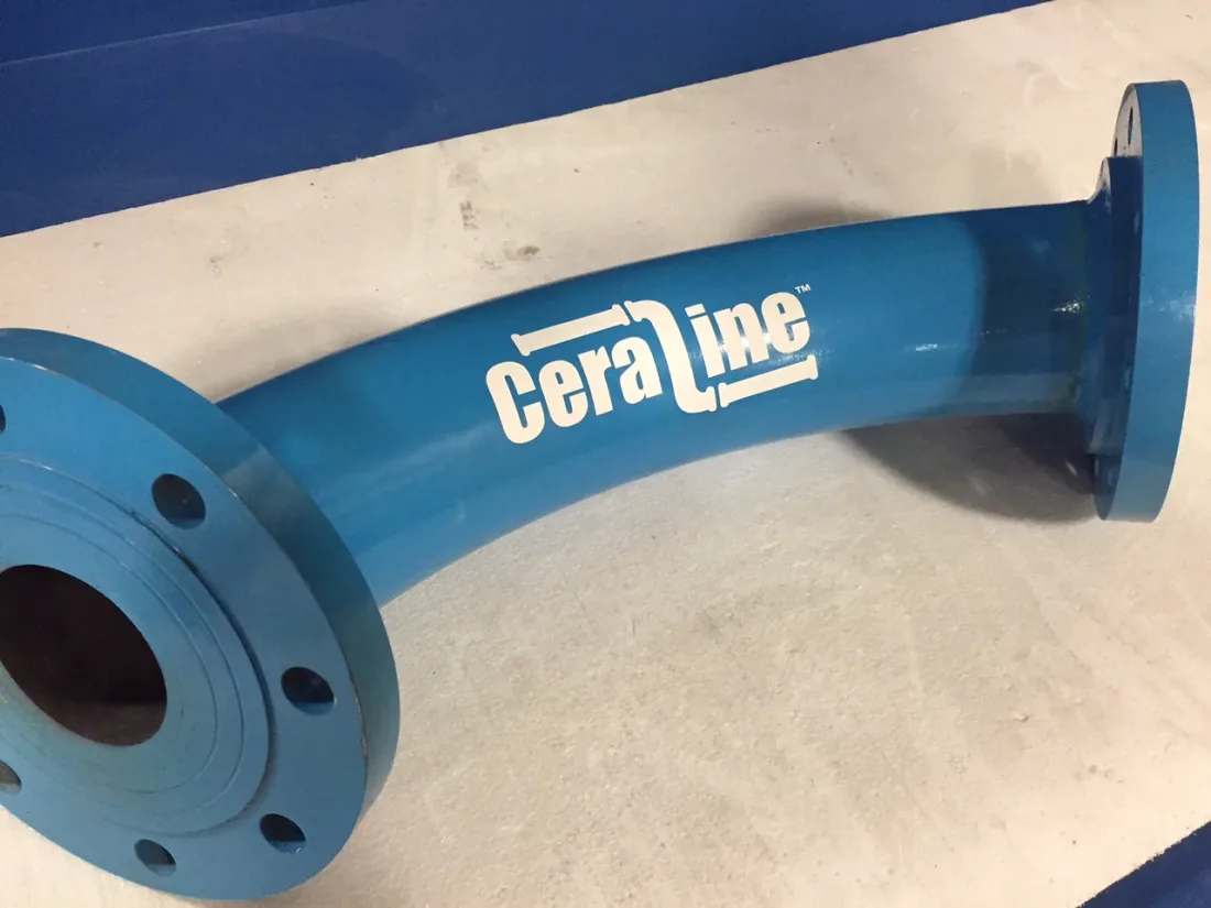 Blue lined elbow with the product name painted on the steel shell