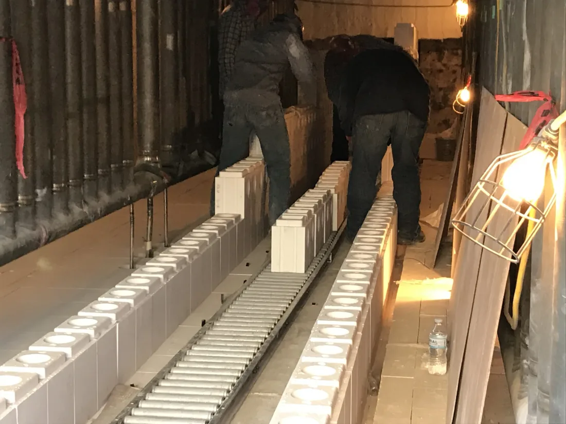 A finished row of precast tunnel blocks in a furnace