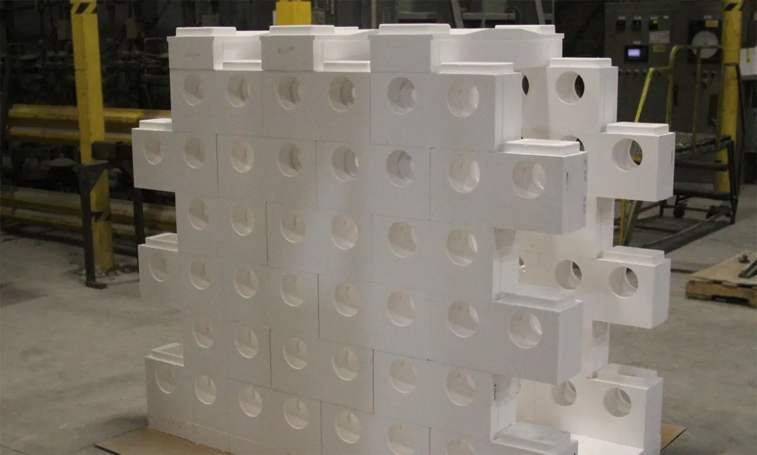 Precast wall section with round openings