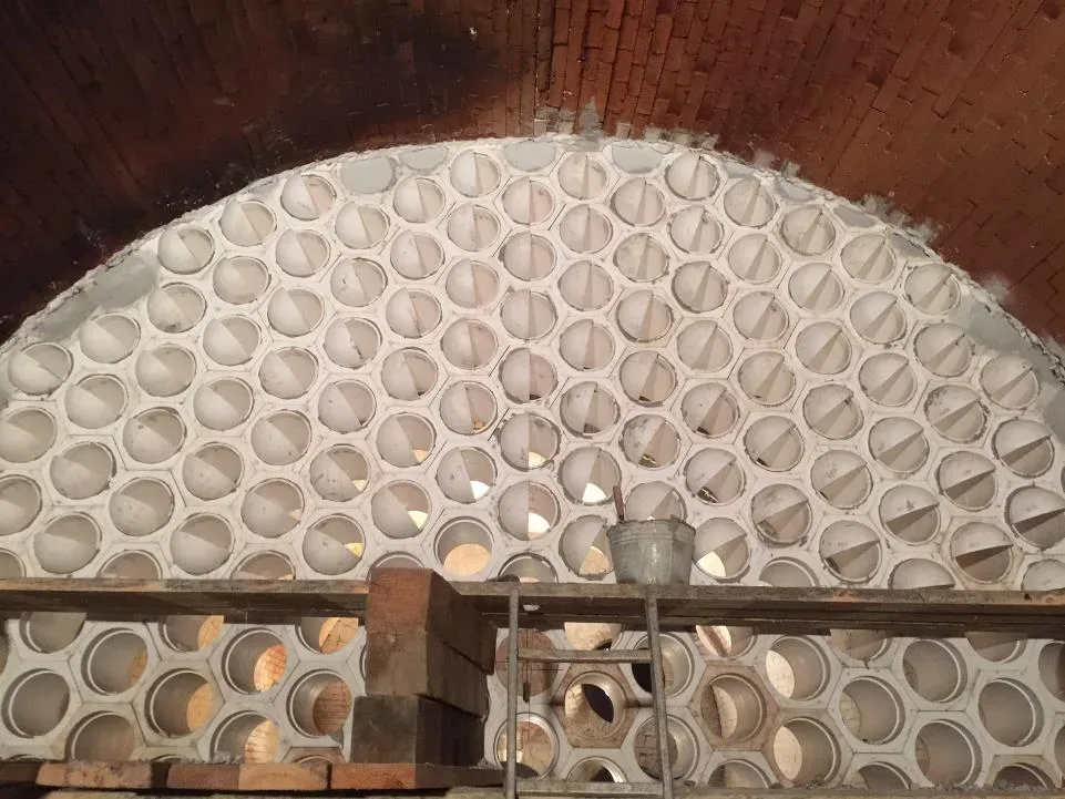 Checkerwall with angled openings installed in a furnace