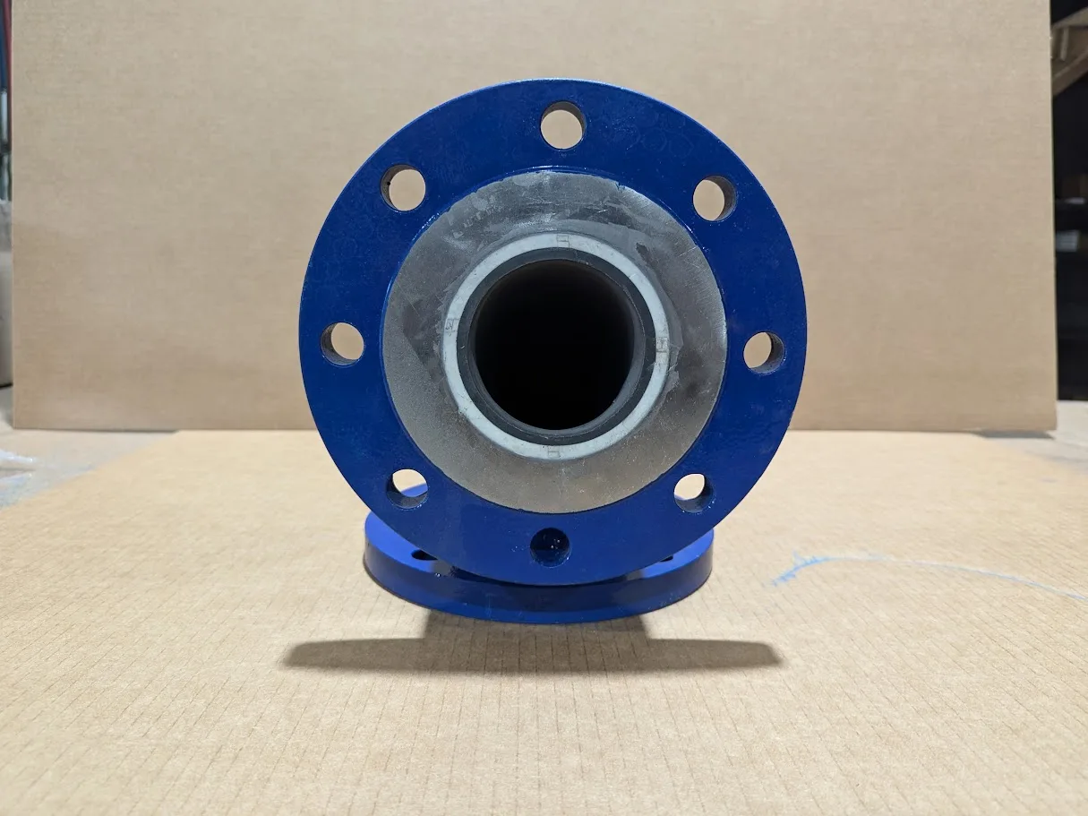 End view of a ceramic lined elbow showing the liner inside the flange