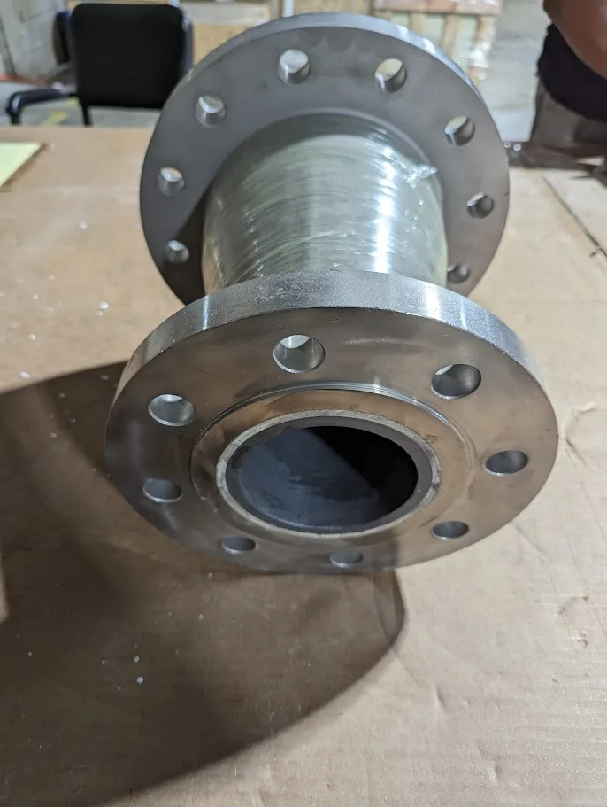 Flanged pipe spool with a ceramic liner, seen at an angle