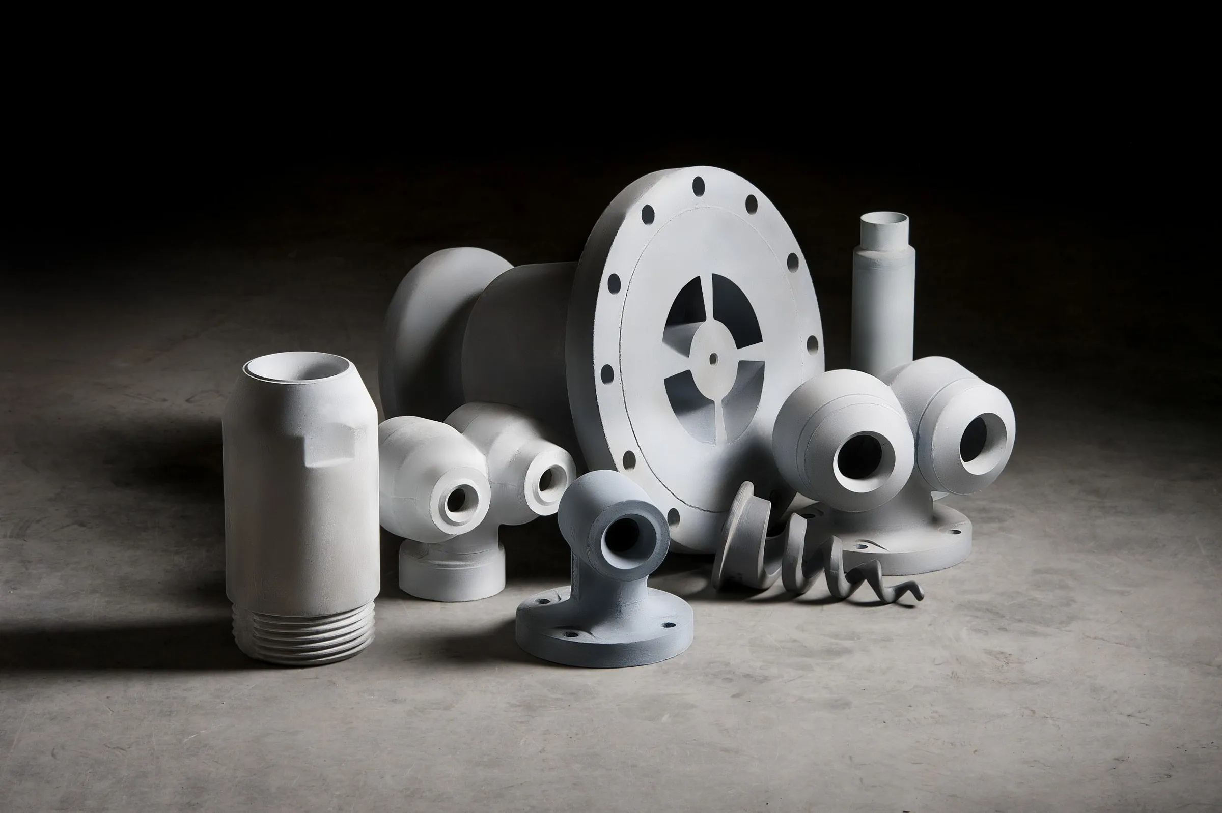 Ceramic spray nozzles and fittings for flue gas desulfurization