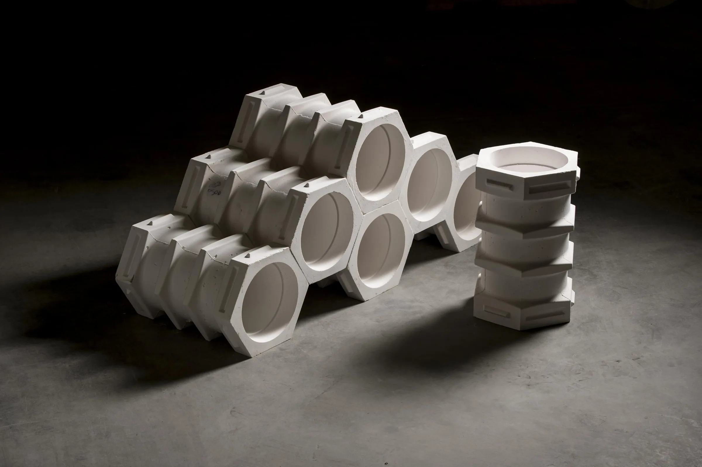 Interlocking hexagonal checkerwall blocks