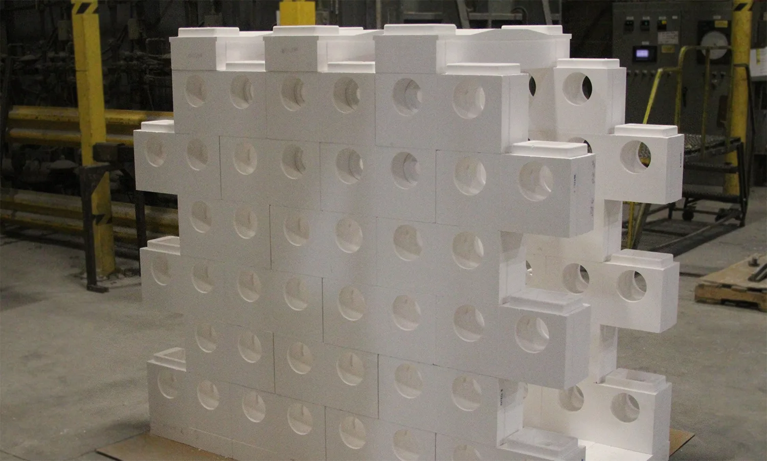 Precast wall section with round openings