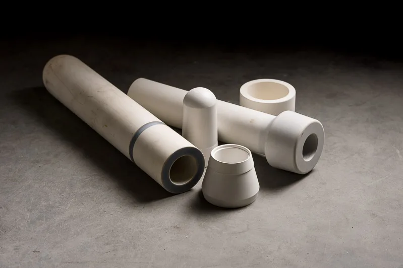 Aluminum titanate riser tube parts